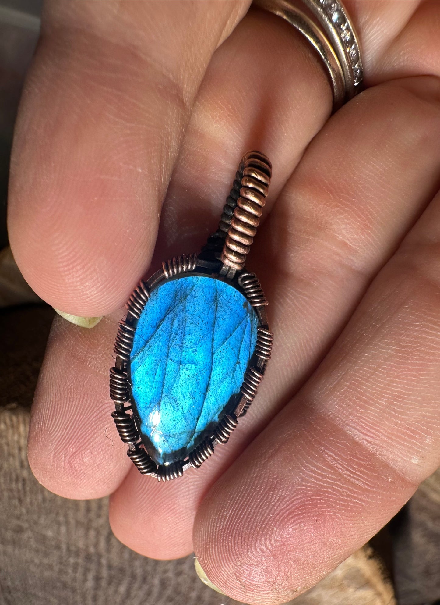 Dark blue labradorite copper pendant
