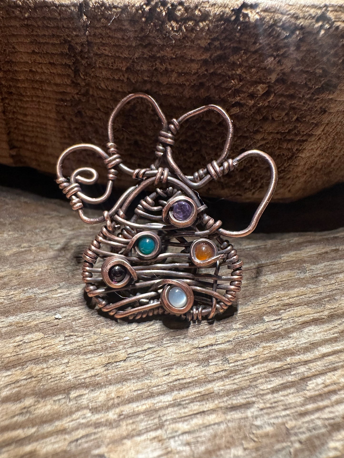 Paw print copper pendant