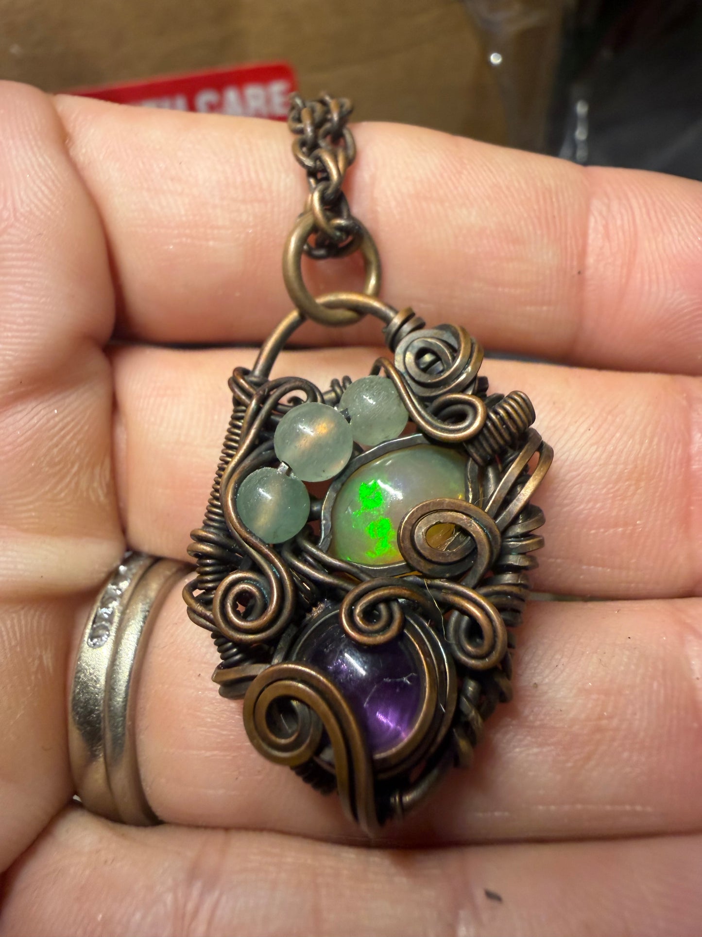 Opal and amethyst copper pendant