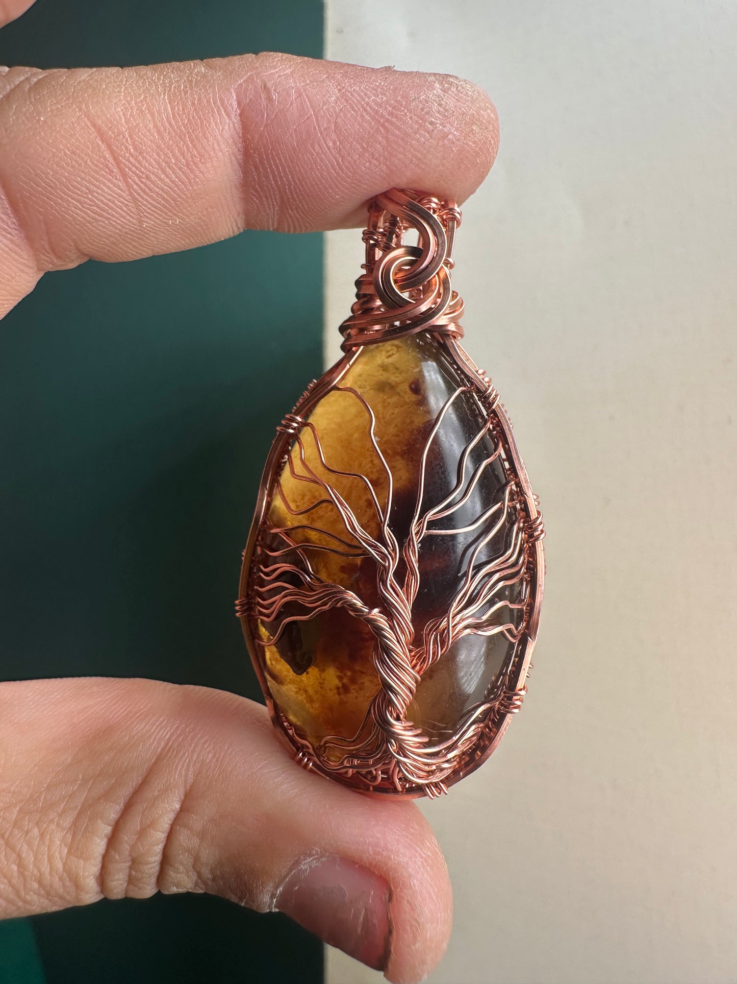 Amber tree of life copper pendant