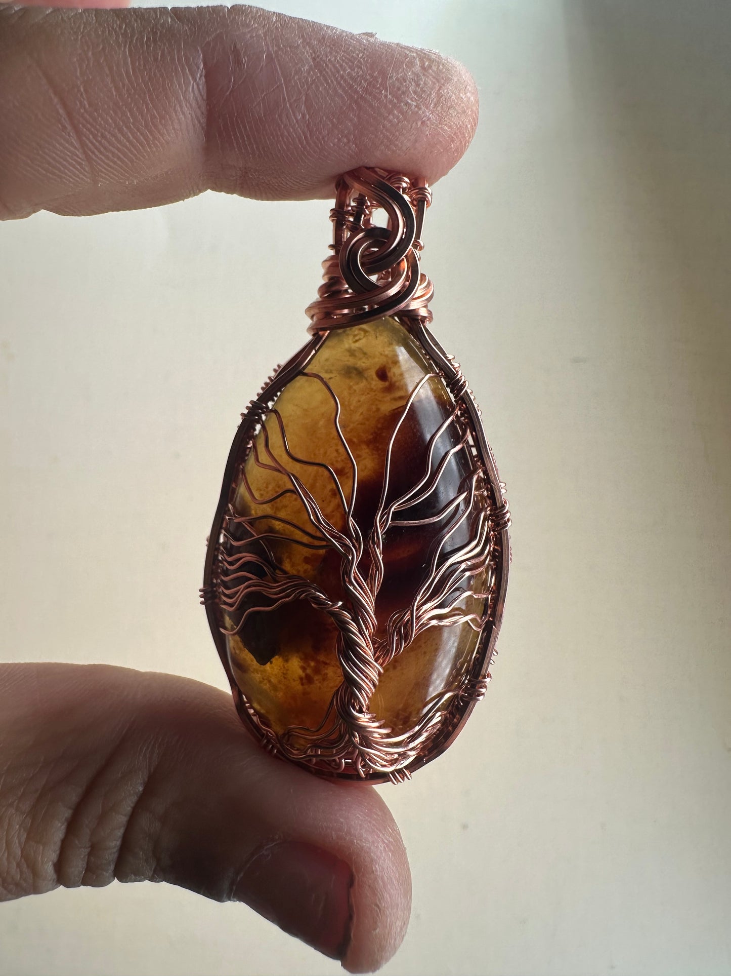 Amber tree of life copper pendant