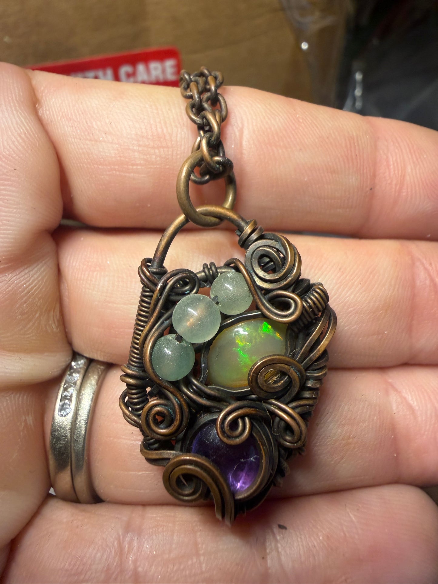 Opal and amethyst copper pendant