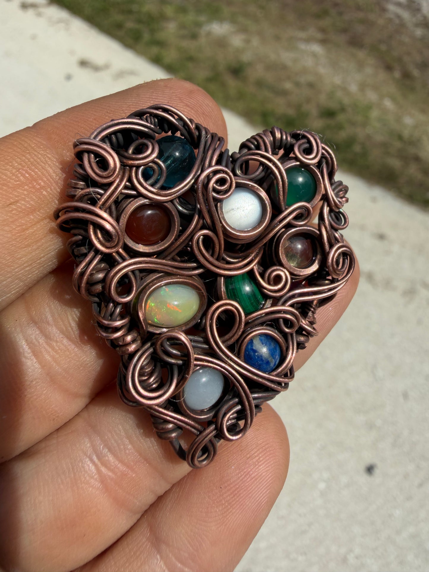 Chaos heart copper pendant