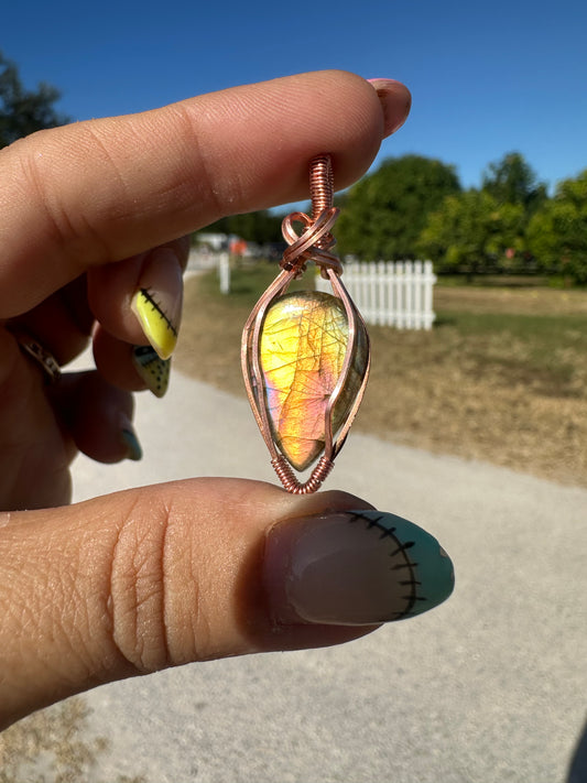 Yellow and purple labradorite copper pendant