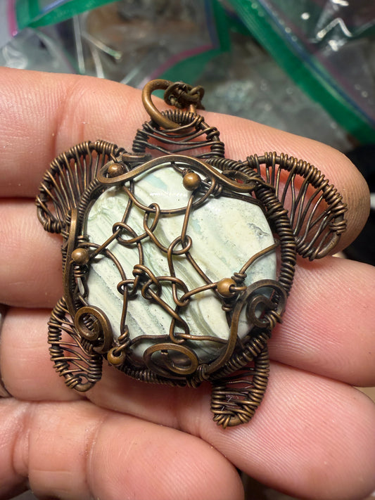 Green banded agate sea turtle copper pendant