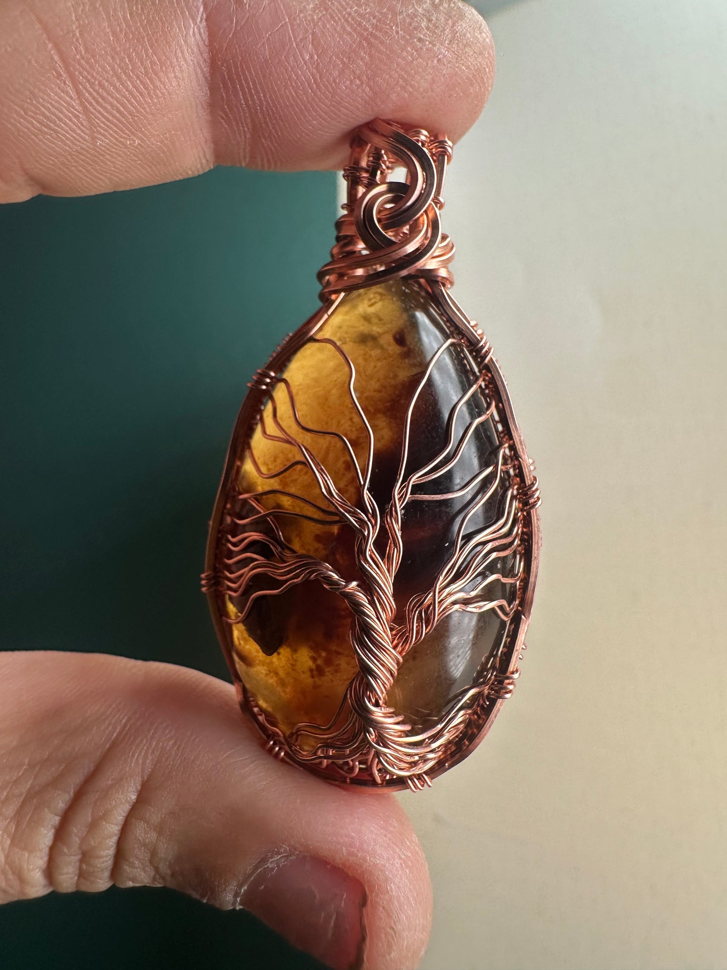 Amber tree of life copper pendant