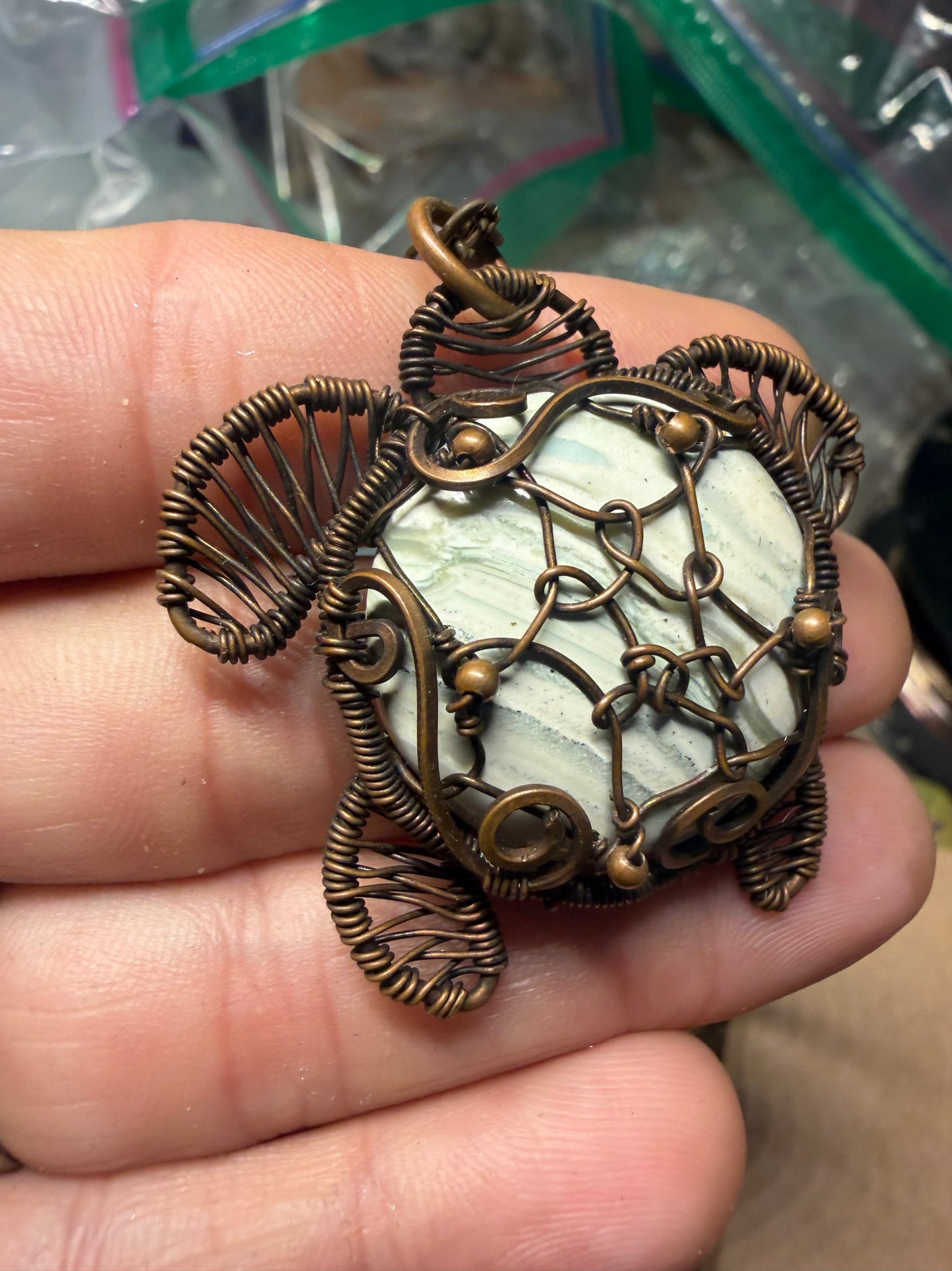 Green banded agate sea turtle copper pendant
