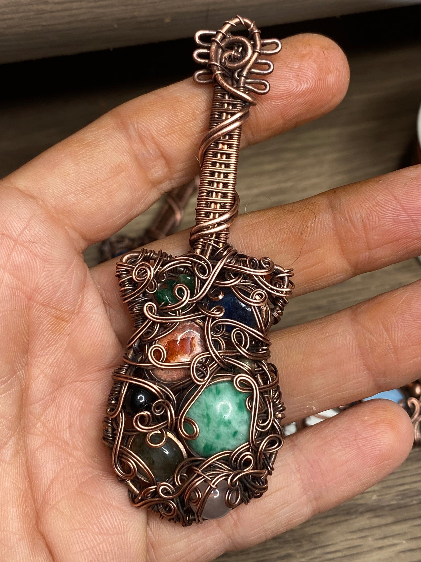 Guitar inspired copper pendant