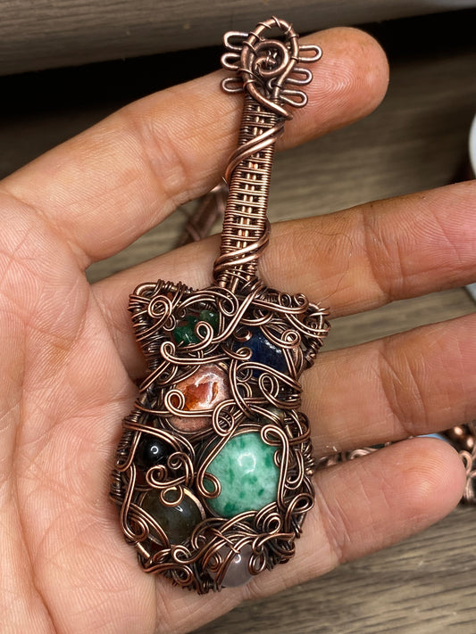 Guitar inspired copper pendant