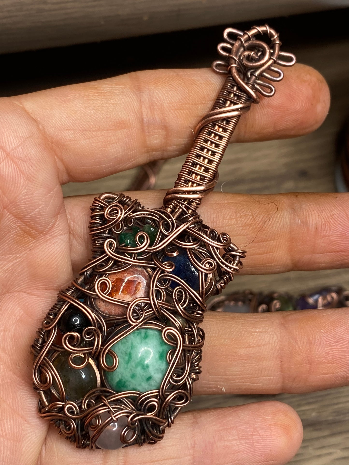 Guitar inspired copper pendant